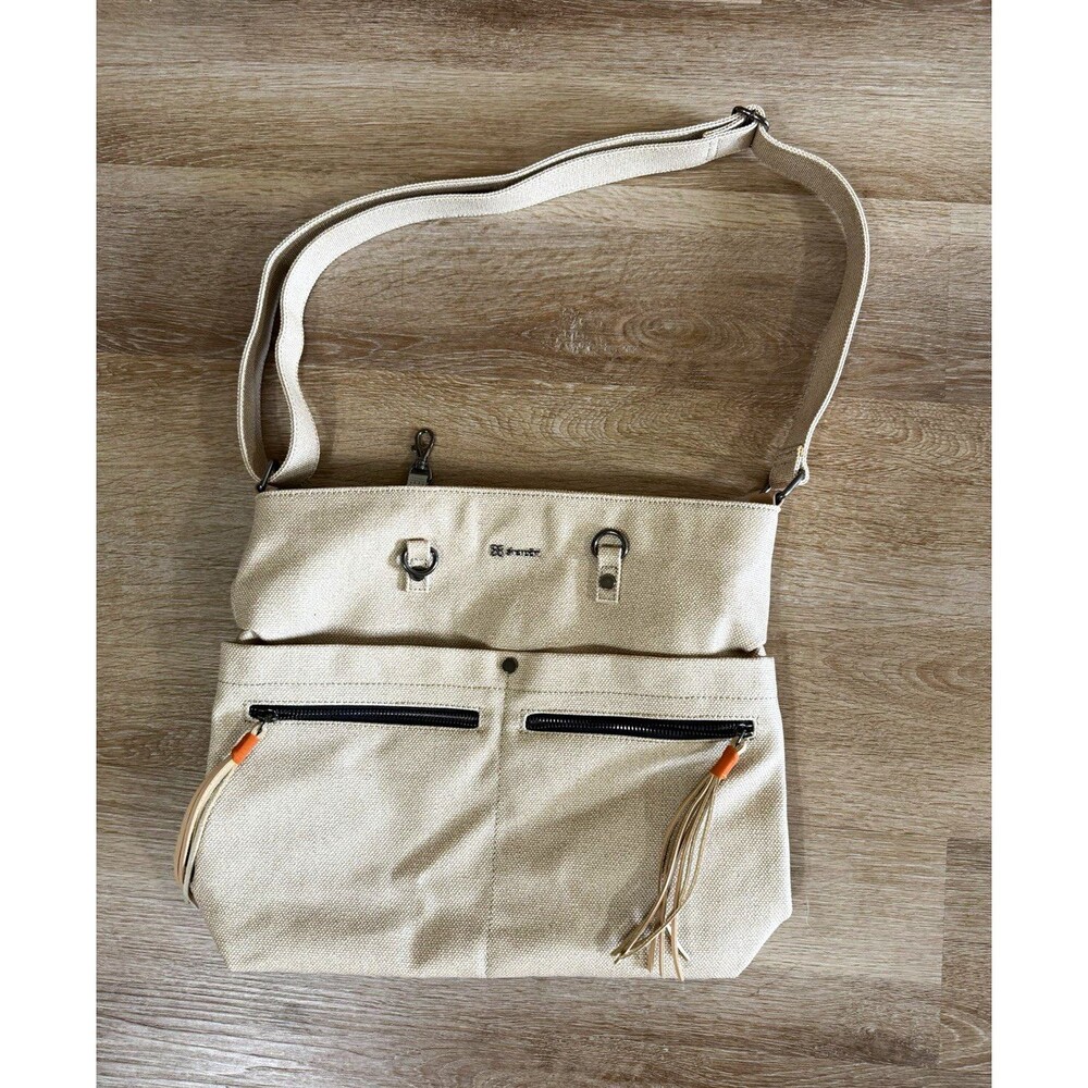Sherpani Beige Shoulder Bag Zip Top Tassel Zipper Pulls Dual Front Pockets
